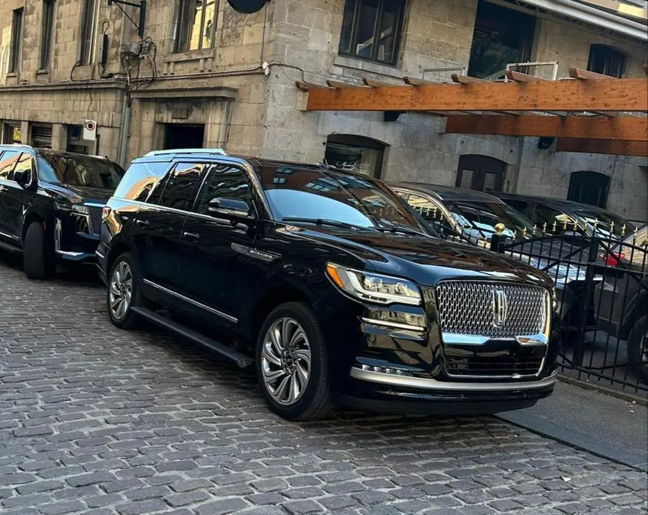 Black Lincoln Navigator on the cobblestones of Old Montreal