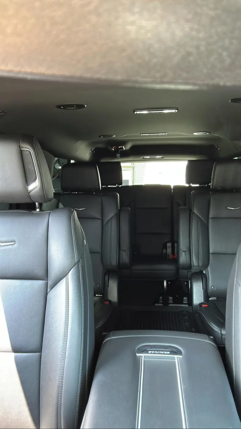 Rear cabin of a luxury SUV with leather captain's chairs